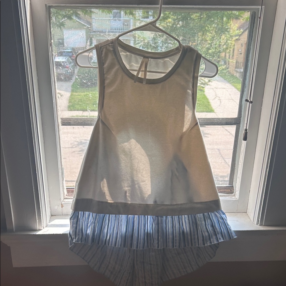 Sleeveless Top with Striped Hem